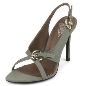 Pointed open toe strappy sandal with buckles.